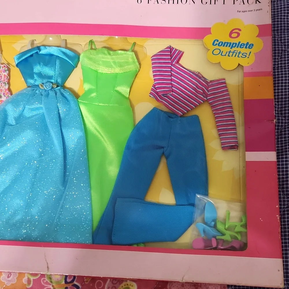 Brand New never opened Barbie fashions.